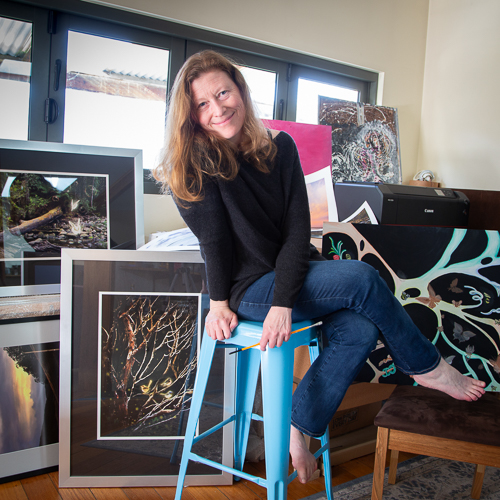 Emma Coombes artist and founder of the Elm and the Raven in her Studio 